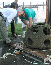 Wayne Young of Maryland Environmental Service and Dr. Don Meritt survey a reef ball